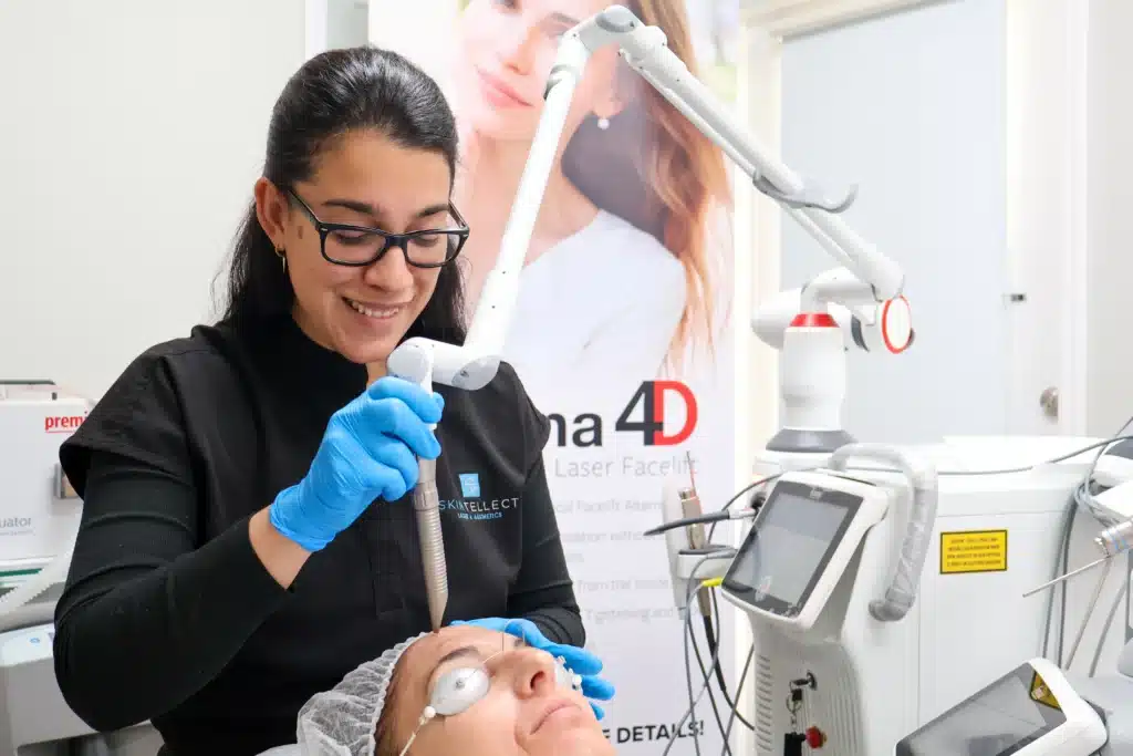 Laser treatment being performed to remove unwanted pigmentation and even out skin tone.