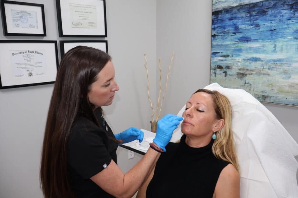 Kristie performing an injectable consultation at Skintellect Laser & Aesthetics