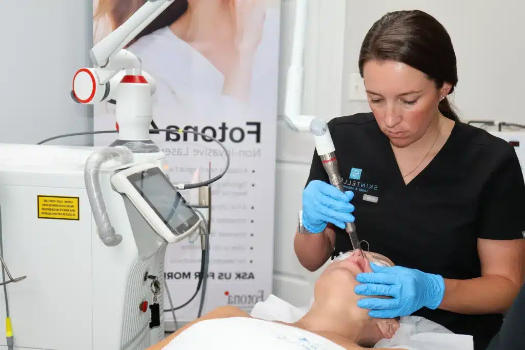 Patient receiving Fotona 4D Laser treatment targeting facial wrinkles and sagging skin.