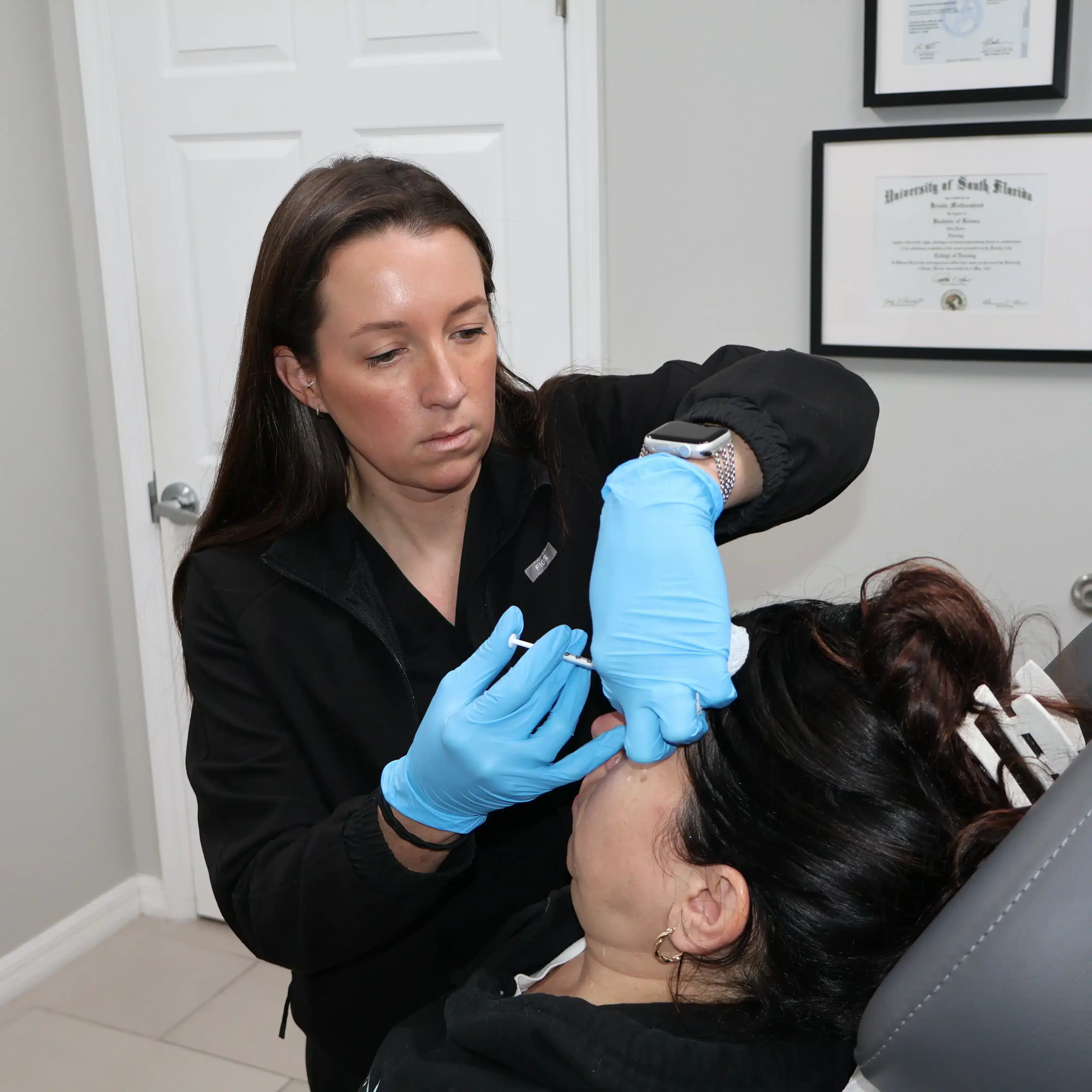 Kristie performing Botox treatment at Skintellect Laser & Aesthetics